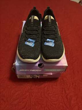 Skechers Black Slip-On Sneakers with Ivory Soles